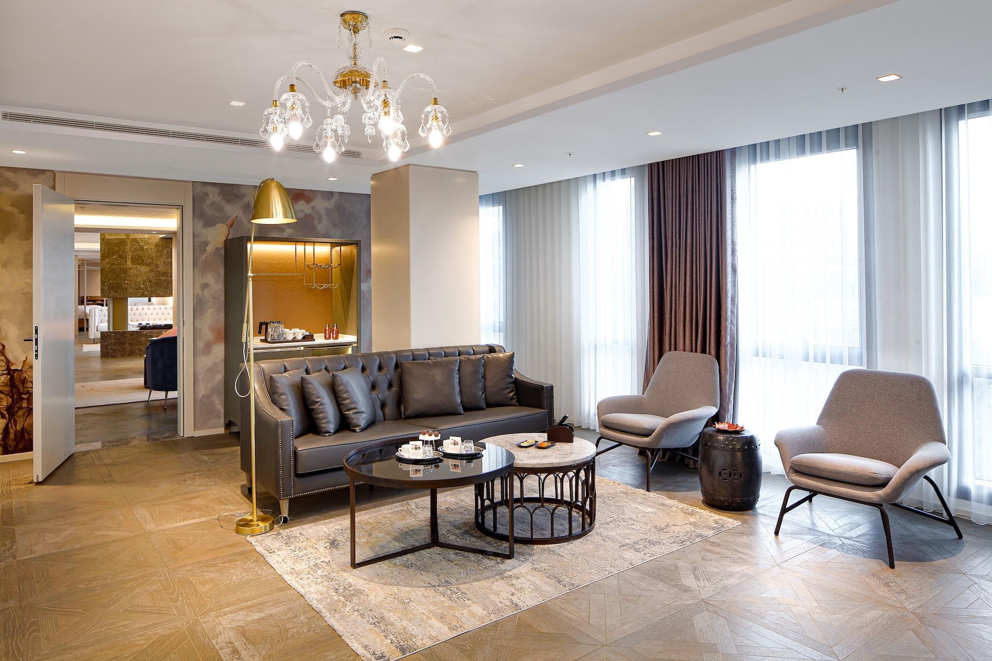فندق Wanda Vista اسطنبول المظهر الخارجي الصورة The living room of a three-bedroom apartment at The Ritz-Carlton, DIFC
